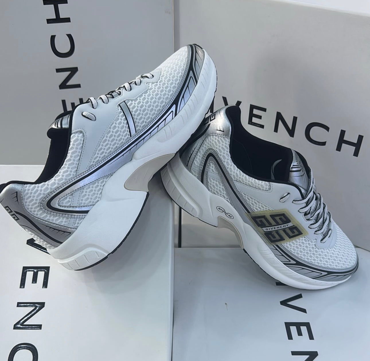 Givenchy NFNTY-52 Low Top Runners Sneakers.